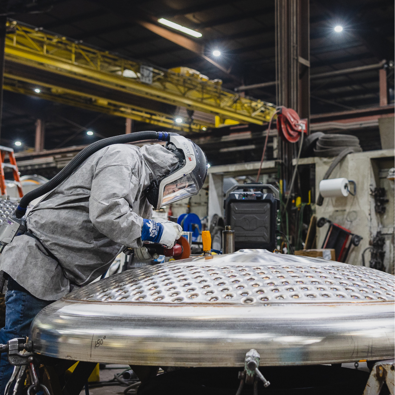 Machinist working in manufacturing plant