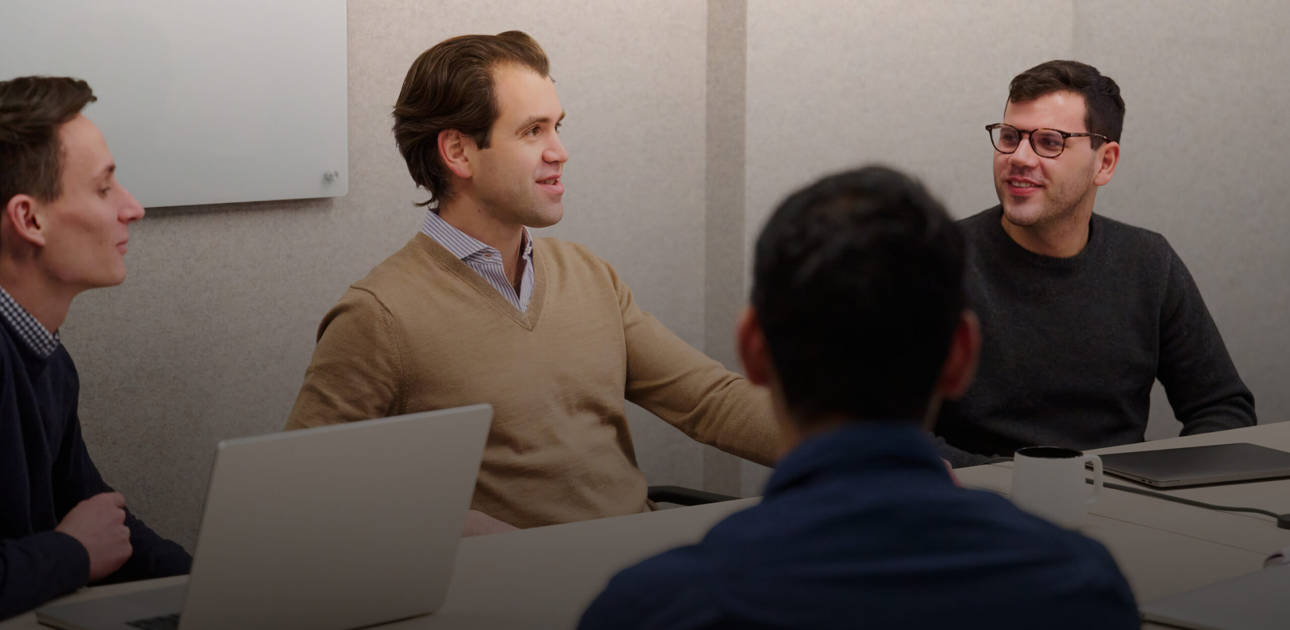 Employees discussing future plans in a business meeting