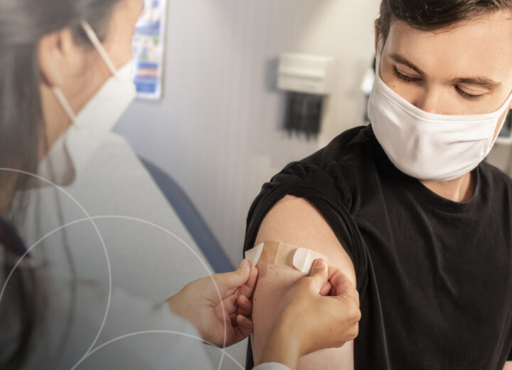 A medical professional administers a vaccine