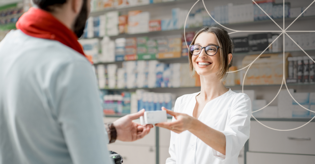 Image of a man receiving prescription meds from a pharmacy